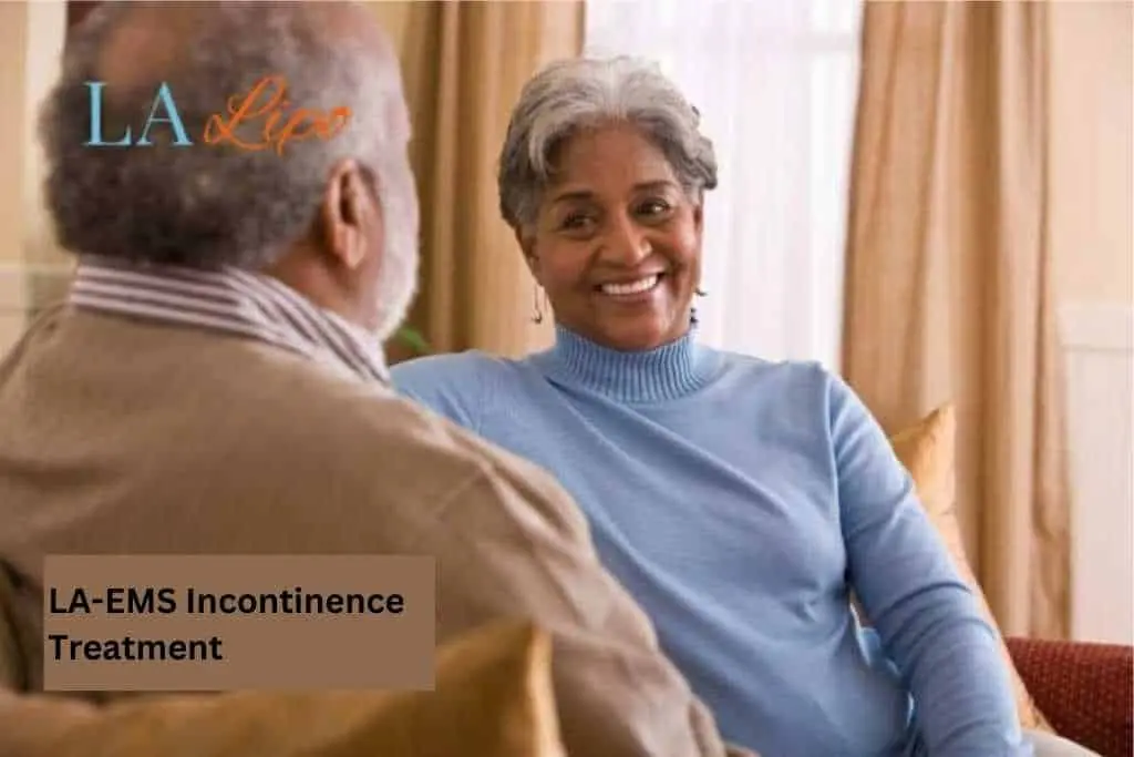 Couple sat smiling at each other - LA-EMS treatment Amersham