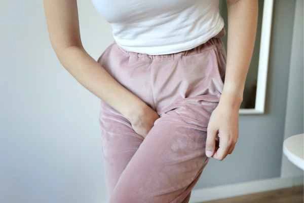 woman running for the toilet because of urinary incontinence Amersham